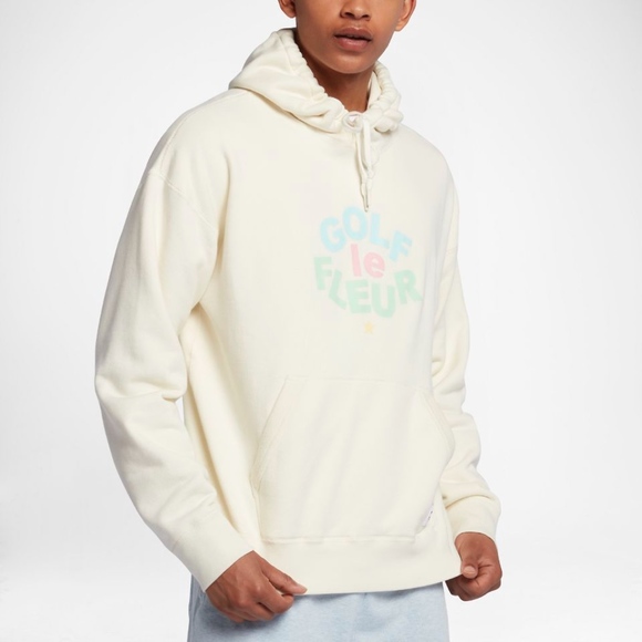 green hoodie black jeans
